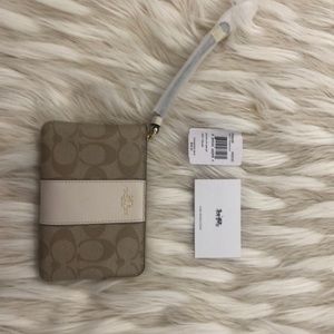 COACH NWT leather wristlet zip tan